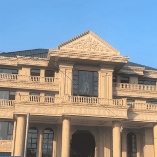 贵港黄金麻别墅外墙干挂石材效果示例